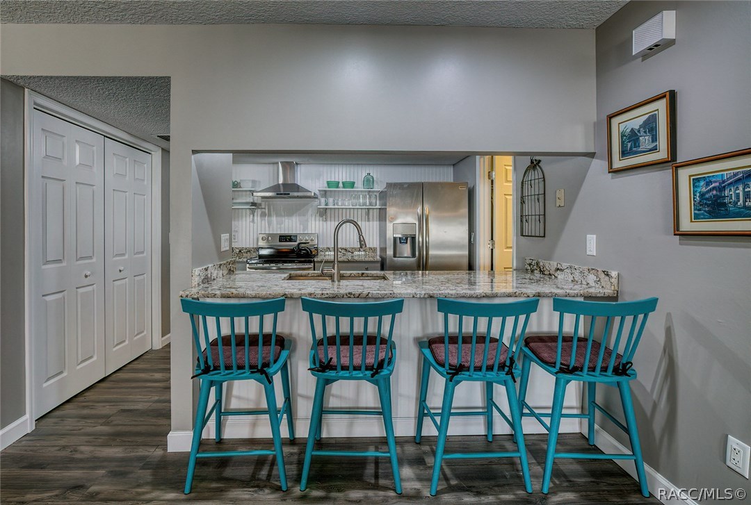 Breakfast bar with new Granite Counter.
