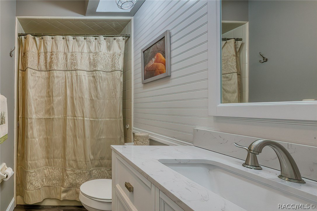 Queen Bath with tub/shower combo.  New high rise toilet.