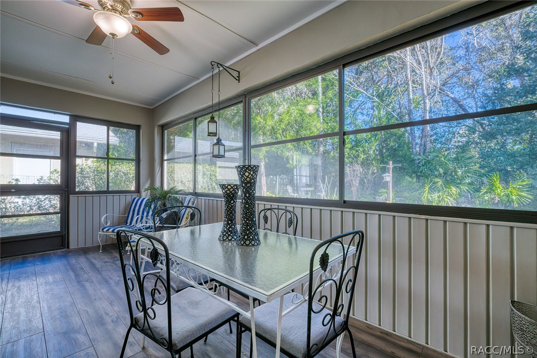 Lanai opens to back yard with more seating and a small outdoor patio.  Grill available.