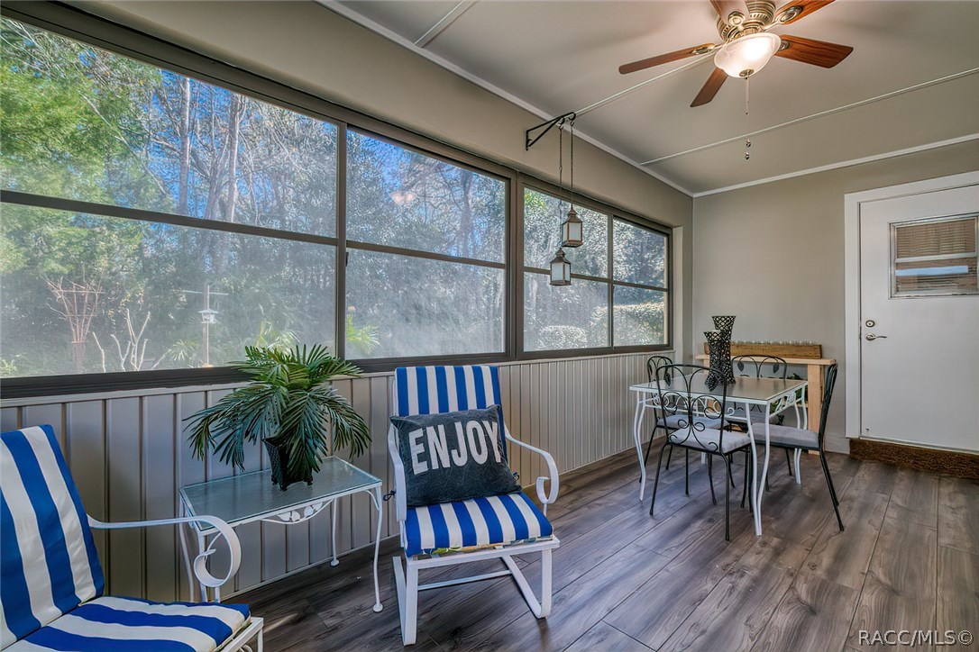 Lanai with screens and vinyl windows that can be opened in nice weather.   Leave the sliding doors open for AC/Heat or there is a small electric heater for those chilly nights.