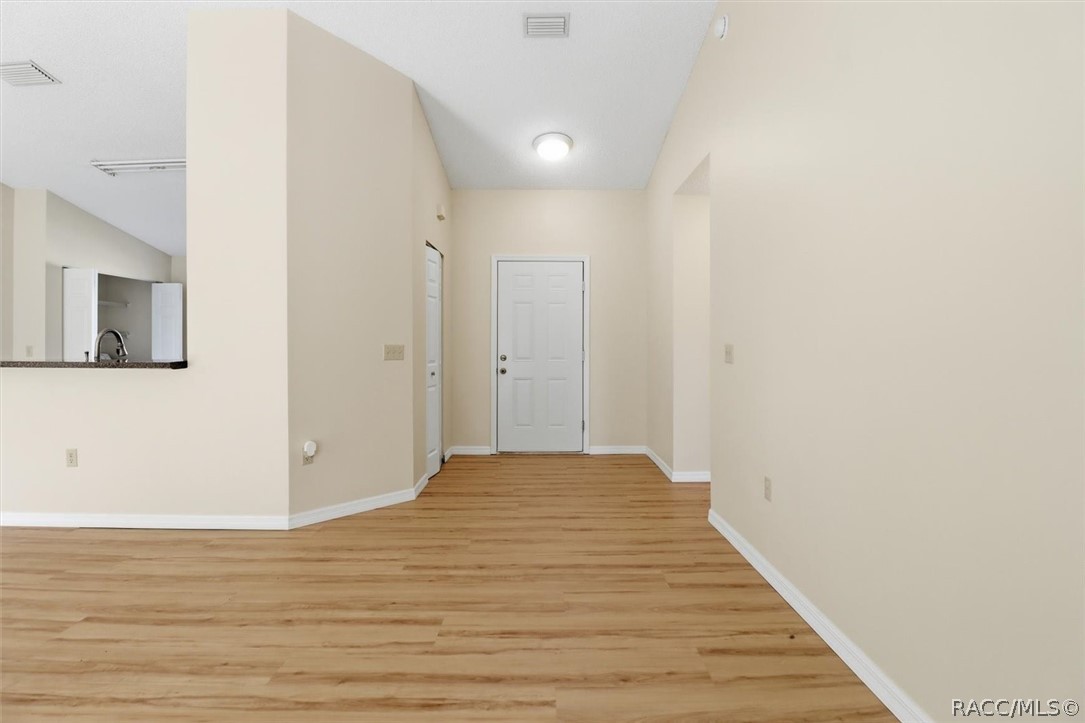 Foyer with storage closet