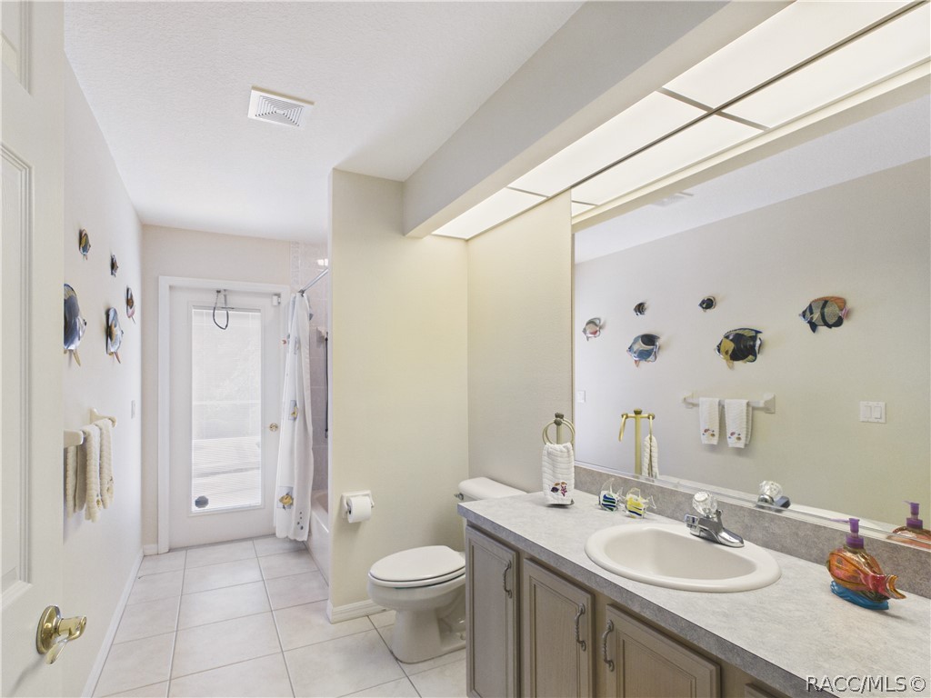 GUEST BATHROOM HAS ACCESS TO THE POOL AREA