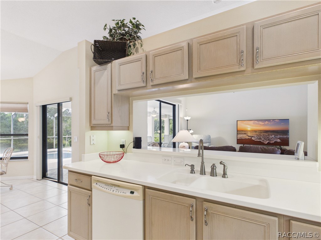 KITCHEN 1 HAS DUAL SINKS ND OPENS TO THE GREAT ROOM