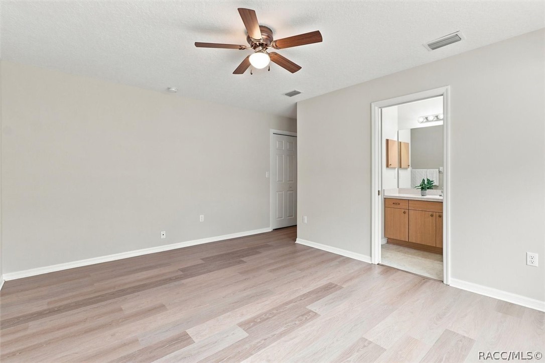 Primary bedroom w/ ensuite