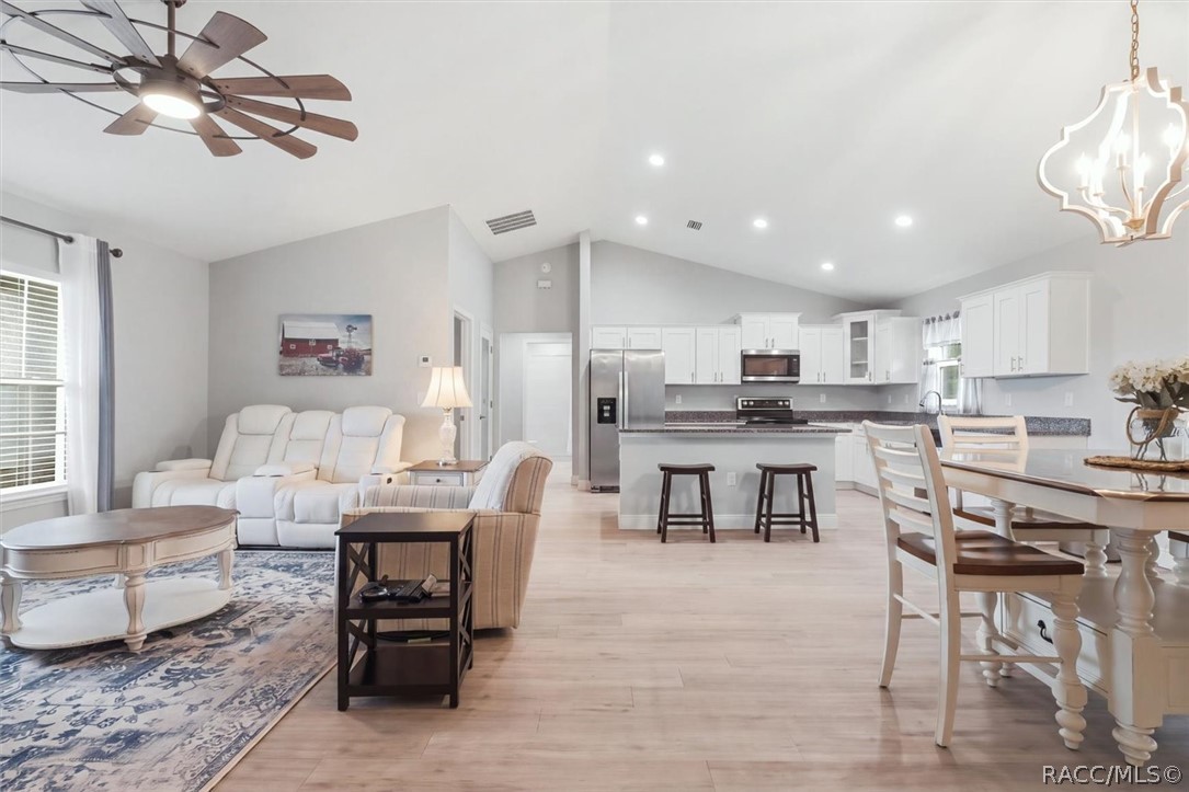 High cathedral ceiling adds to the open concept