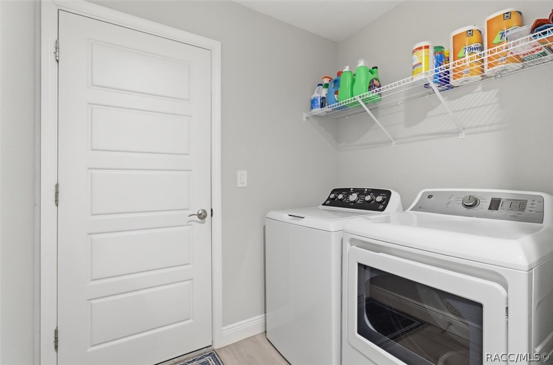 Laundry room; washer and dryer convey with the sale
