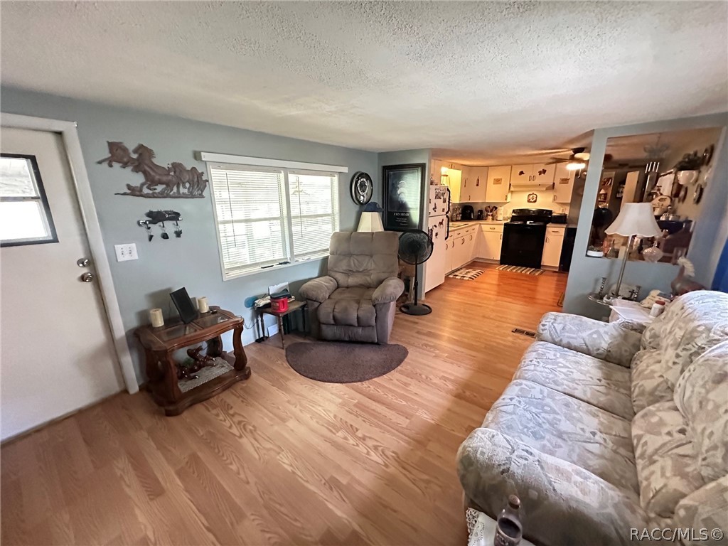Living room to kitchen and front porch