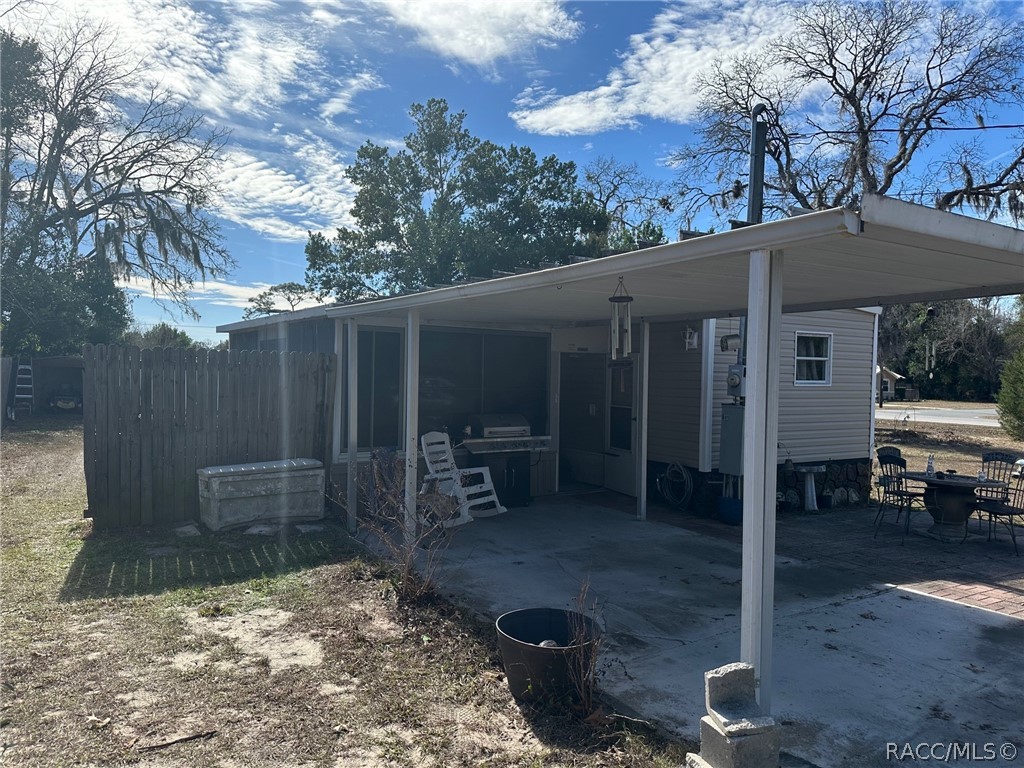 Carport and rear screened porch