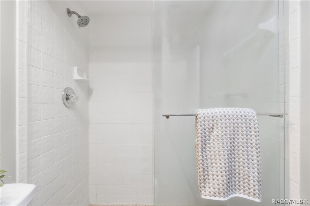 Glass enclosed walk-in shower