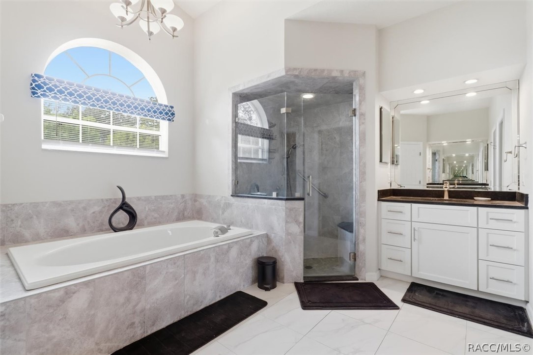 Dual sinks and walk-in shower