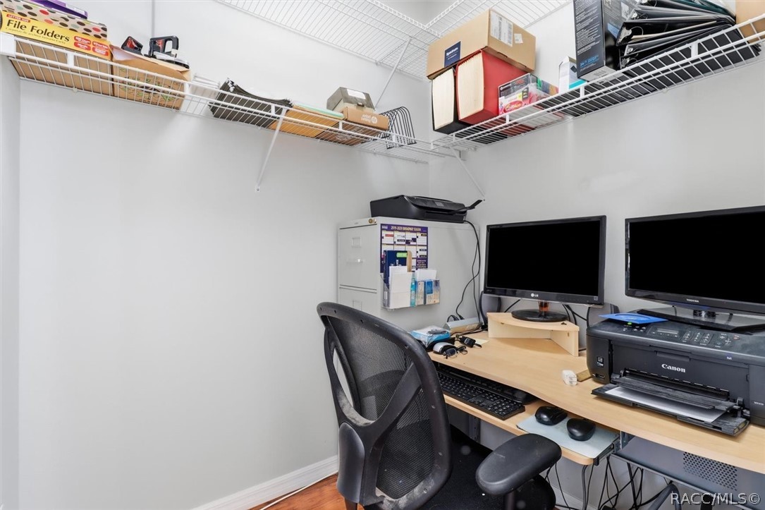 Small work space or large storage closet off the foyer