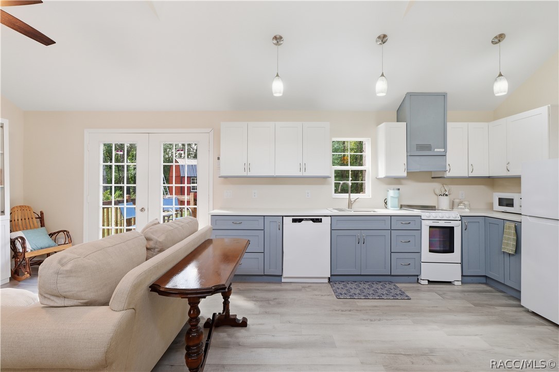 Open Kitchen & Living Area  Enjoy the seamless connection between the kitchen & living room, offering comfortable space for everyday living & entertaining.