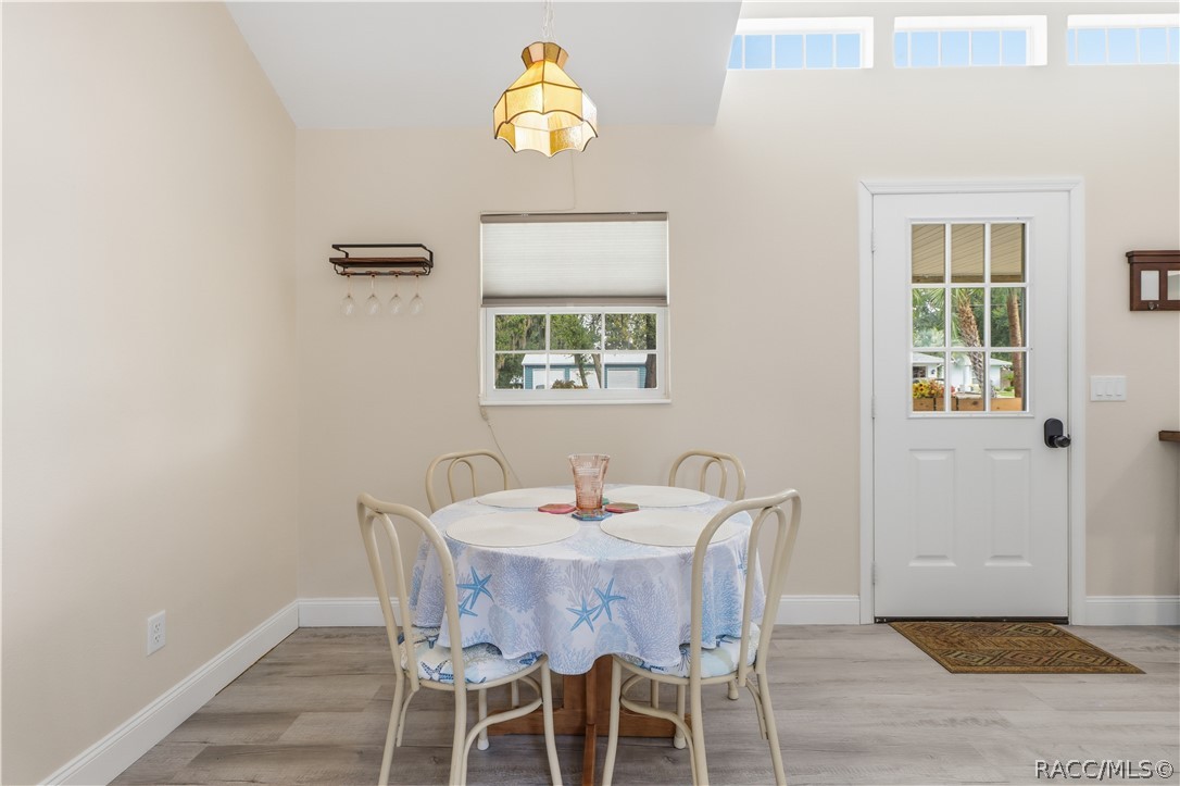 Dining Area  Comfortable dining space w/natural light, vaulted ceiling & convenient access to the kitchen & living area.