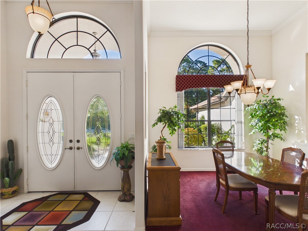 FOYER WITH THE DINING ROOM TO THE LEFT