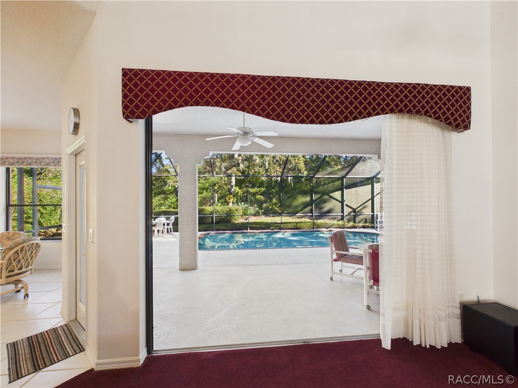 GREAT ROOM OPENS TO THE LANAI AND POOL