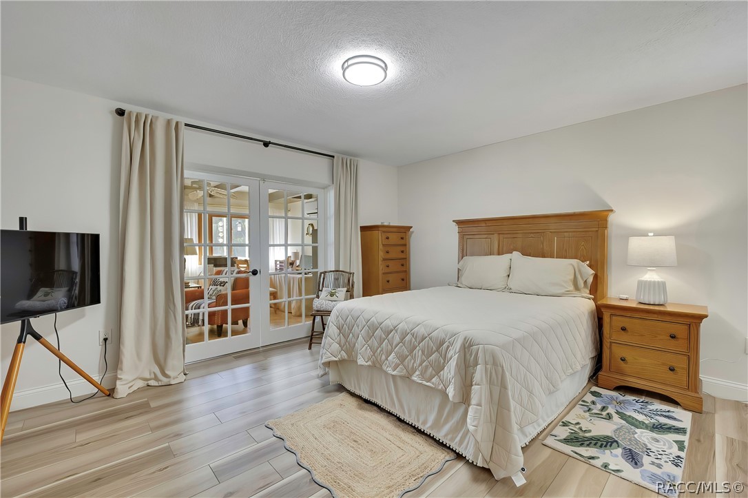 Bedroom with sliding glass doors.