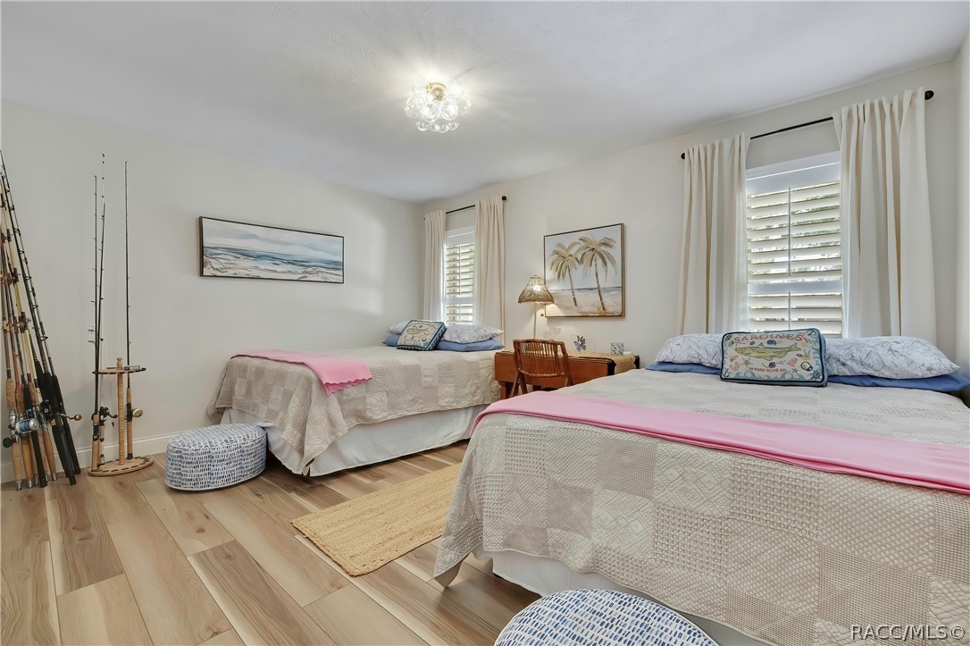 Guest bedroom with two beds.