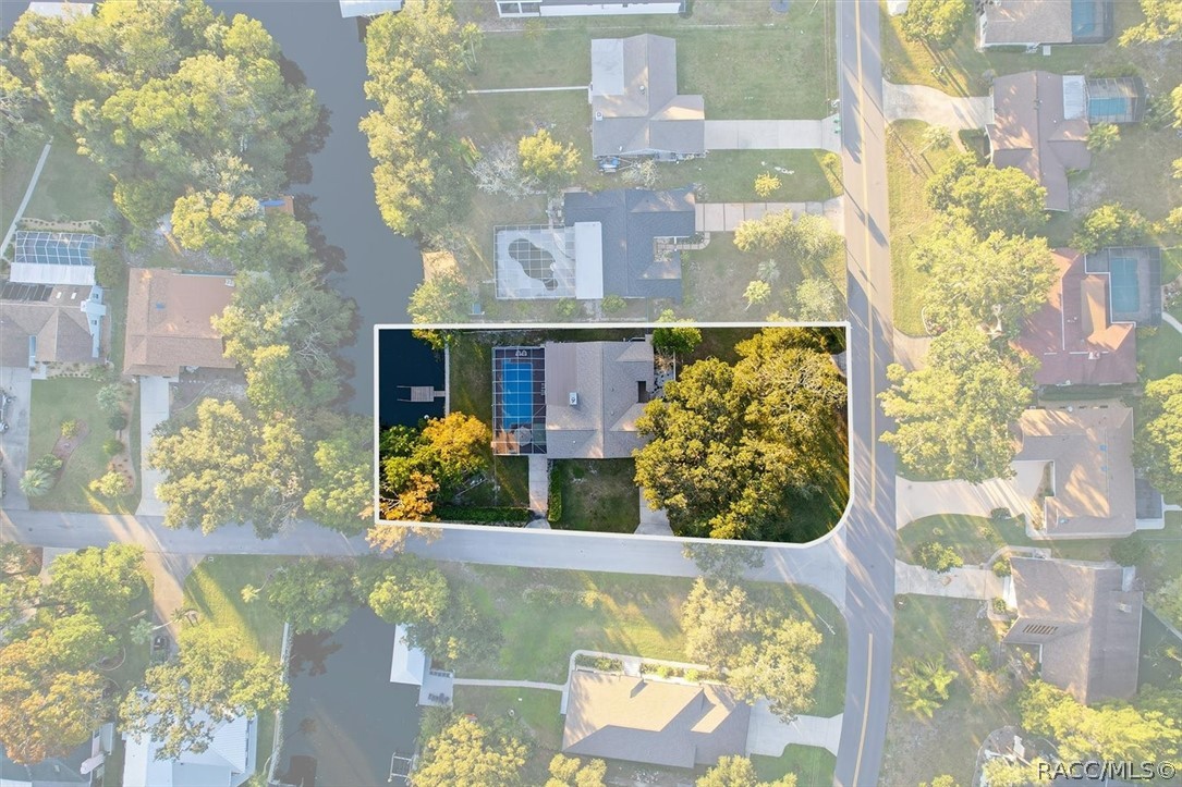 Aerial view with the lot outlined. Aerial view with the lot outlined.