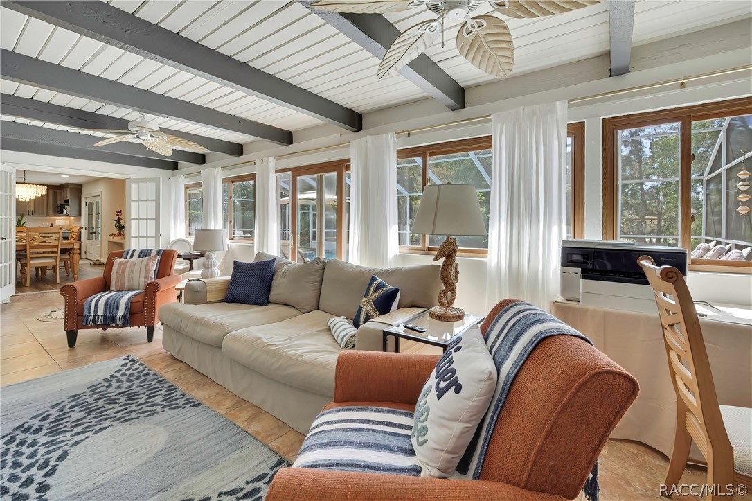 Family room seating area with wall-mounted TV