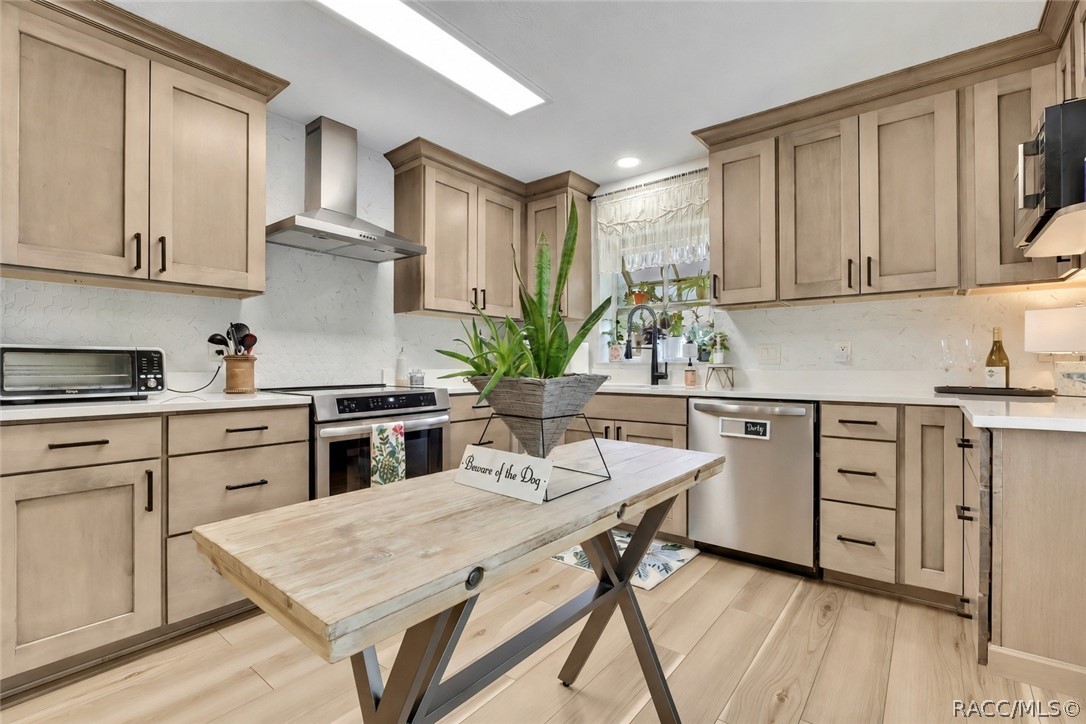Kitchen cabinets and island from another angle.