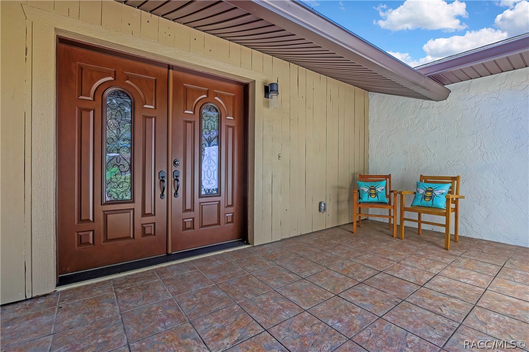 Double front doors opening to the covered entry. Double front doors opening to the covered entry.