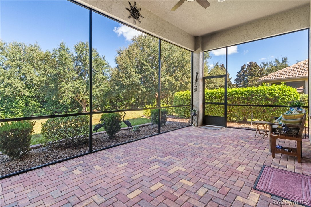 The spacious 12 by 23 lanai overlooking the back yard and greenspace, is the perfect spot for morning coffee or your favorite afternoon beverage.