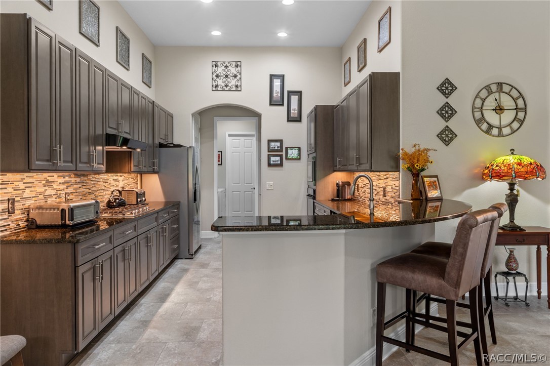 The spacious cook's kitchen is one of the largest villa kitchens offered. Both beautiful and functional with loads of storage.