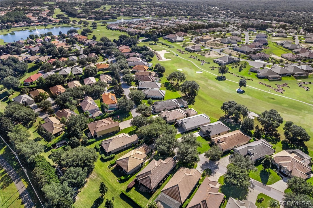 Expanded aerial view looking east of this villa.