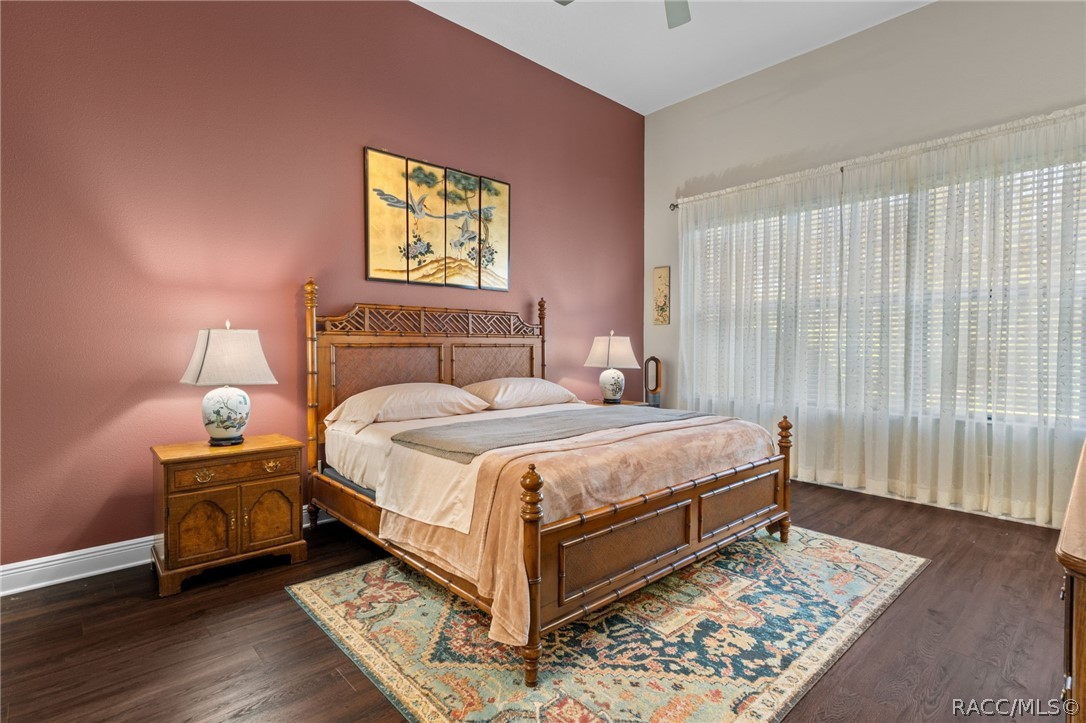 The primary bedroom suite, featuring easy care luxury vinyl plank (LVP) flooring, is situated in the back of the home providing privacy from the rest of the house.
