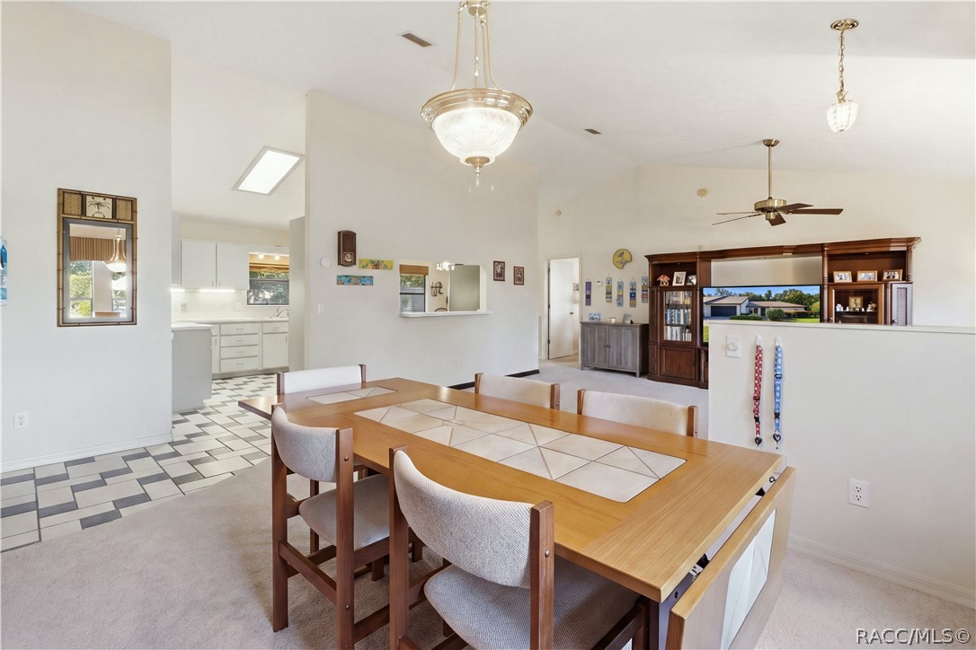 GATHER AROUND THE TABLE! Enjoy the comfortable FORMAL DINING AREA w/an open connection to the living room & kitchen!