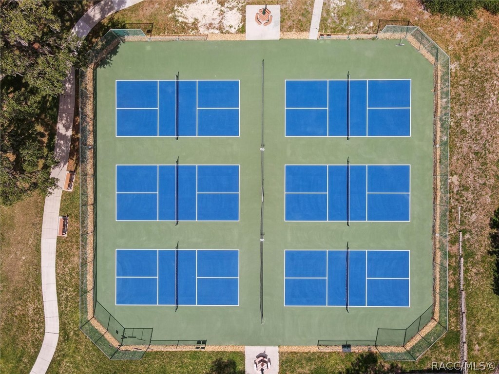 PICKLEBALL/
GAME, SET PICKELBALL! Enjoy SIX PICKLEBALL surrounded by mature trees & beautiful natural scenery. Perfect for staying active, enjoying friendly competition & connecting w/neighbors!