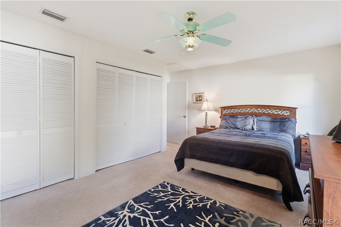 ROOM TO RELAX! PRIMARY SUITE features GENEROUS CLOSET SPACE w/multiple louvered closet doors, soft neutral carpeting & ceiling fan! ROOM TO RELAX! PRIMARY SUITE features GENEROUS CLOSET SPACE w/multiple louvered closet doors, soft neutral carpeting & ceiling fan!