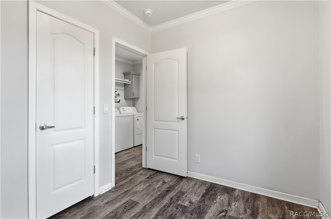 FLEXIBILITY FOR YOUR LIFESTYLE! Another view of this room highlights the attractive flooring, natural light & convenient access to the indoor laundry area.