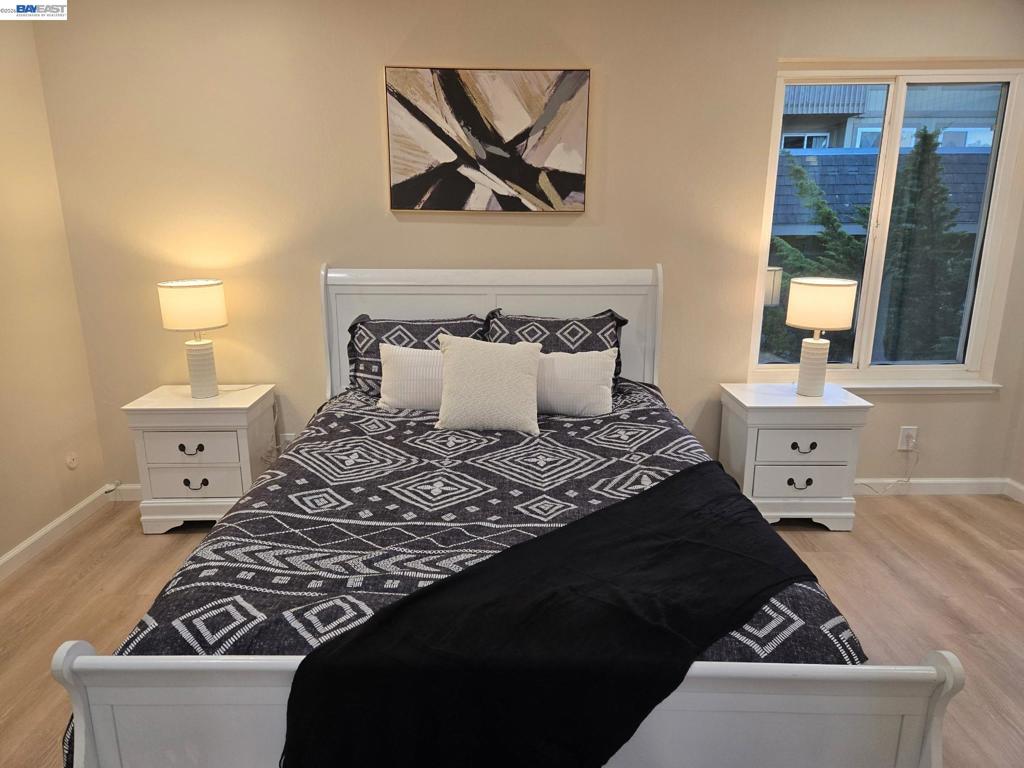 Large bedroom with wall to wall closets