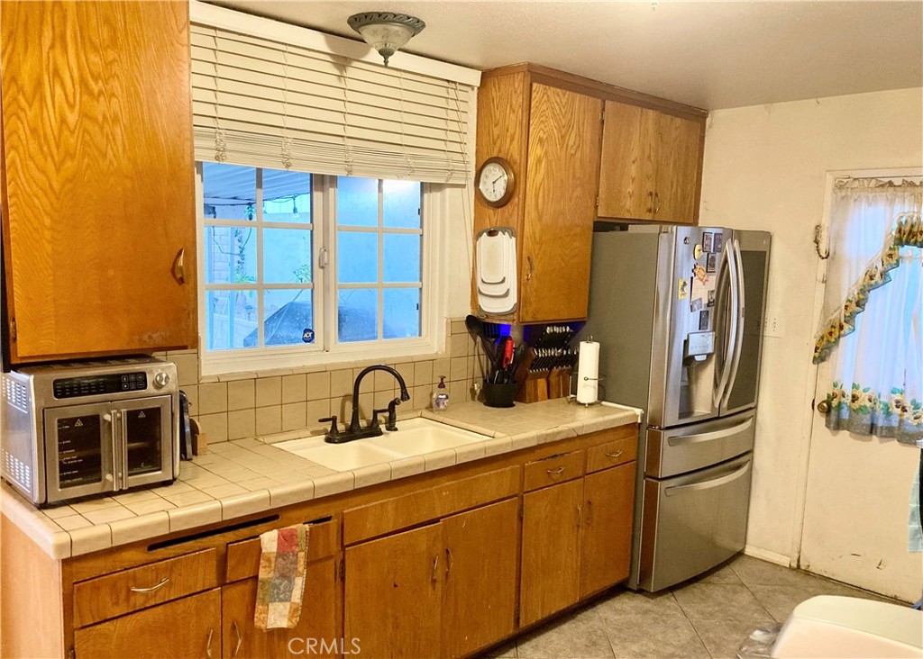 Kitchen sink view to patio & rear yard