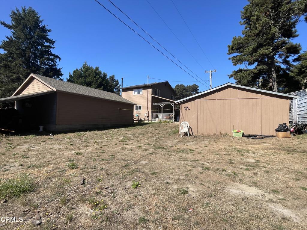 Eastside of outbuildings and home