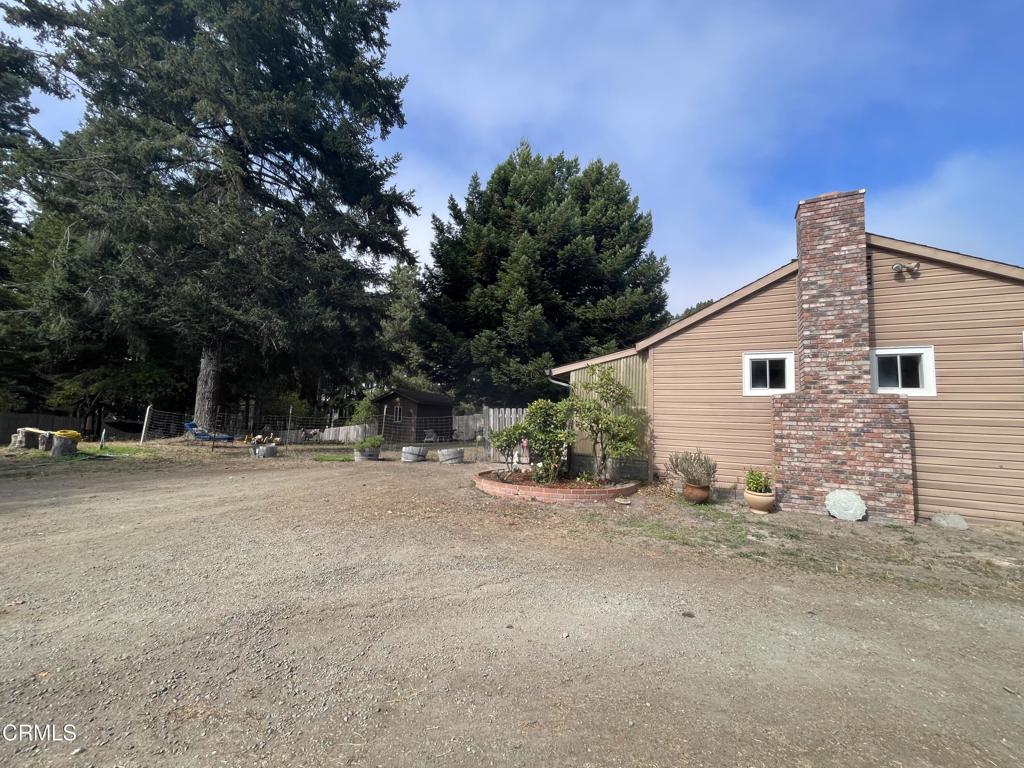 Parking and south fenced yard