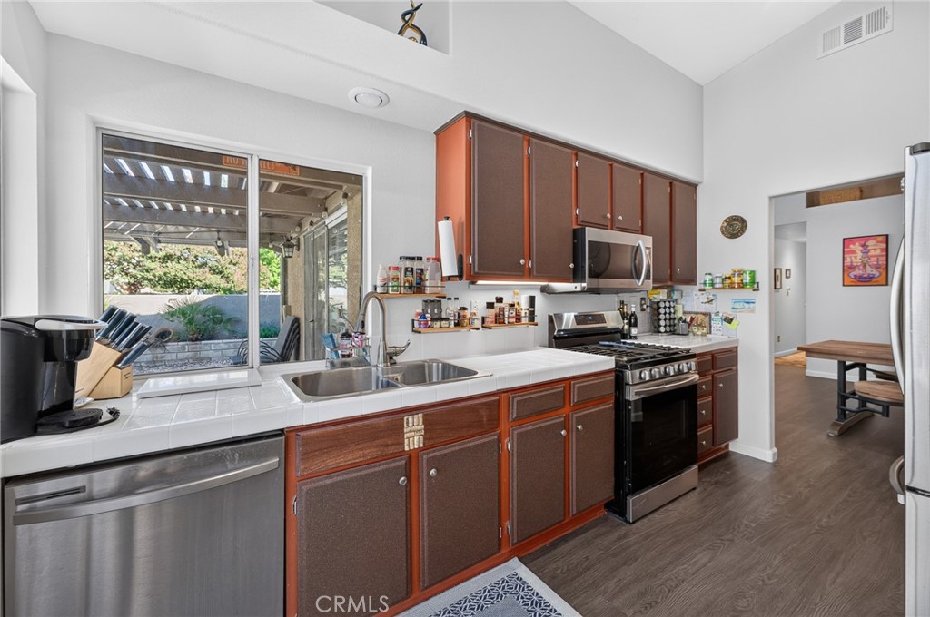 Kitchen has Window above Sink overlooking Back Yard