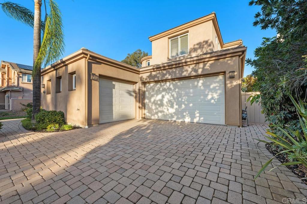 Oversized garage with built in cabinets, car charger