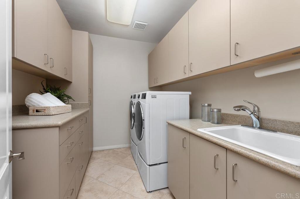 This Laundry room has a laundry shoot from second floor.