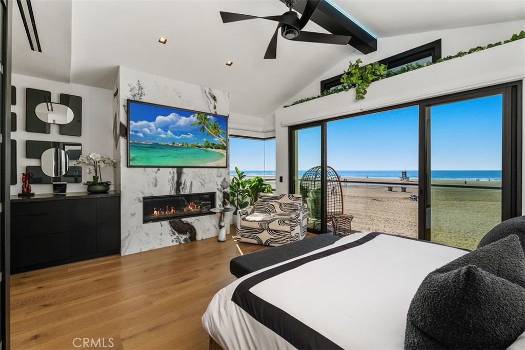 Primary bedroom with balcony