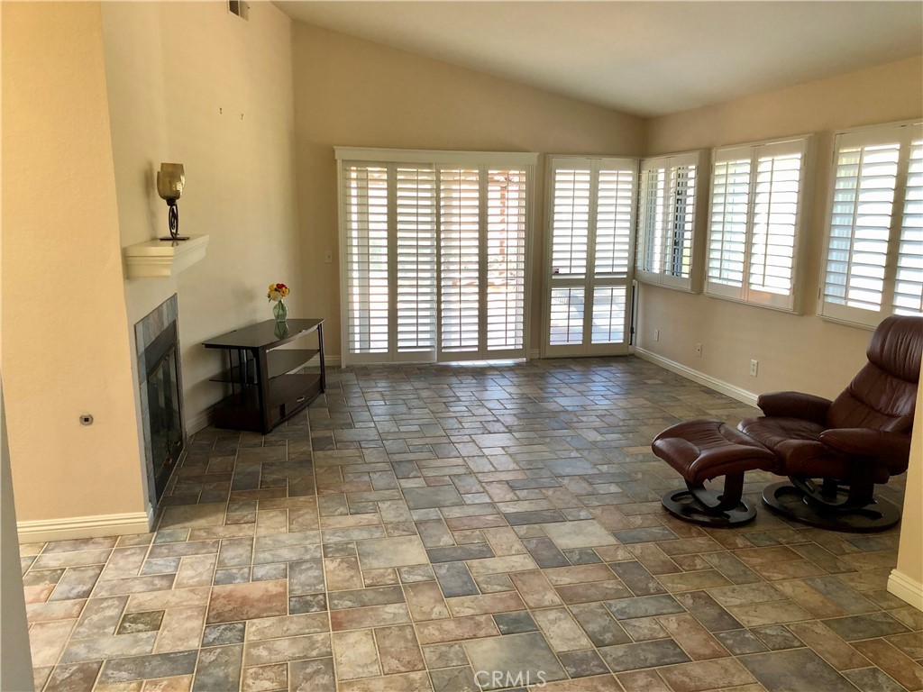 Large living area that opens to a large back yard and patio where you can enjoy the view and ocean breeze.