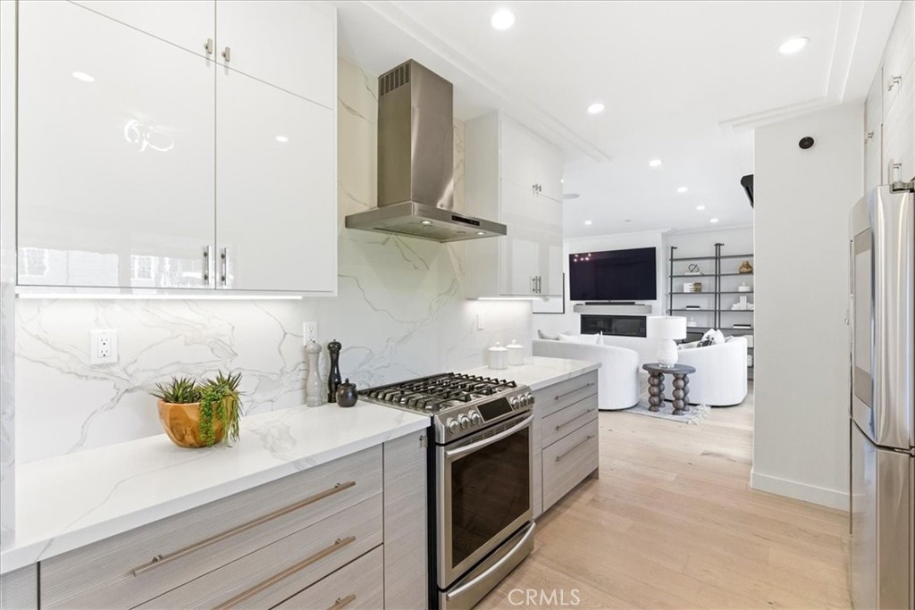 Kitchen, with the living area beyond.