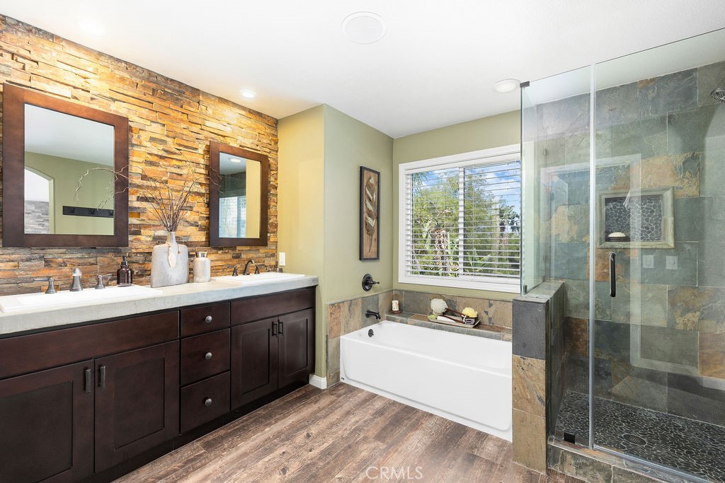 Primary En-Suite Bathroom with Separate Soaking Tub and Walk In Shower