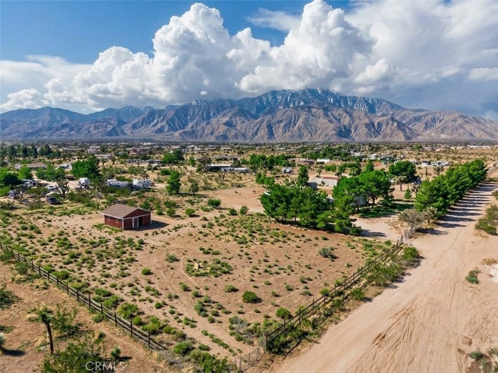 2.25 acres fenced off in two large squares with direct access of the main road for each lot.