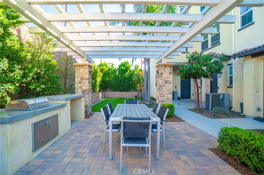 Community BBQ area with outdoor dining