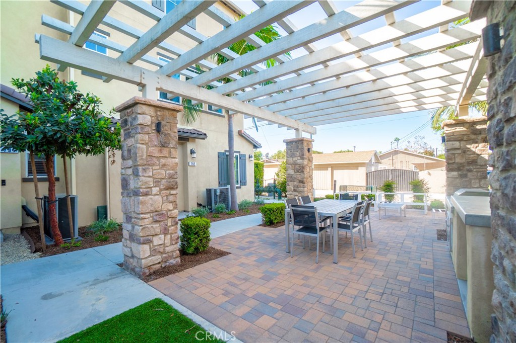 Community courtyard with pergola and seating