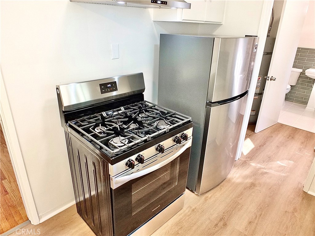 New Gas Stove and Fridge included.