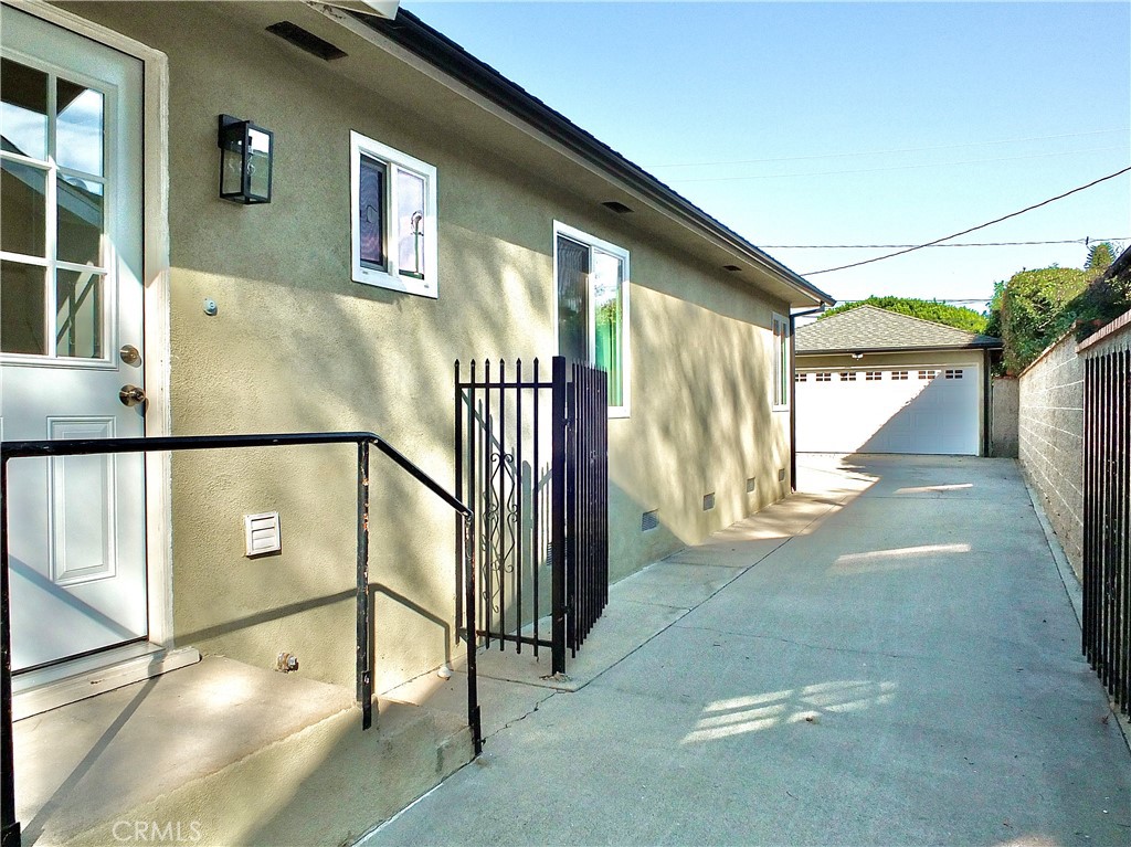 Convenient side entrance with brand new door and light