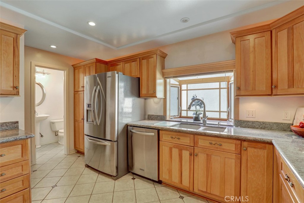Kitchen towards 1/2 bath.